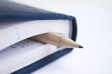 Image showing Pencil on a book