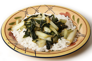 Image showing Sauteed bok choi on a bed of jasmin rice side view