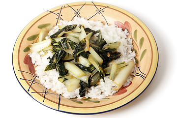 Image showing Sauteed bok choi on a bed of jasmin rice