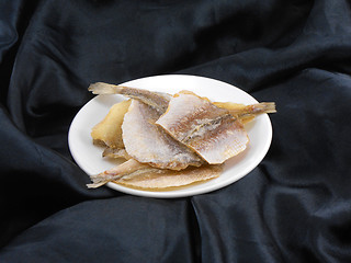 Image showing Sea bream fish on a white plate