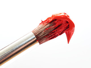 Image showing Paintbrush with red paint 