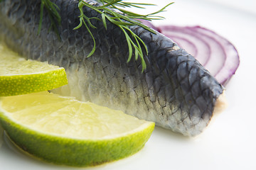 Image showing Fillet herring with onion and lemon