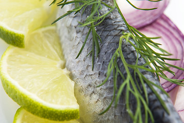 Image showing Fillet herring with onion and lemon