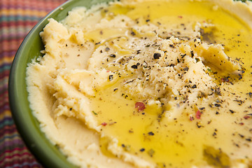 Image showing A bowl of creamy hummus