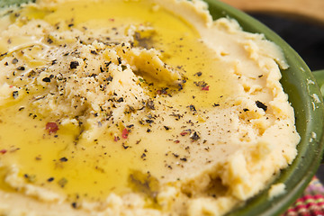 Image showing A bowl of creamy hummus