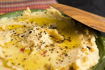 Image showing A bowl of creamy hummus