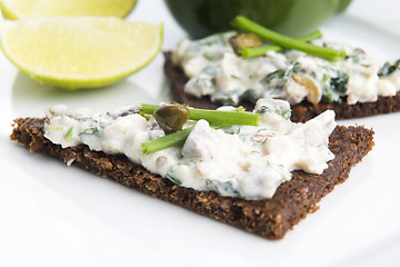 Image showing sandwiches with dark bread, herrings, mushrooms, pepper