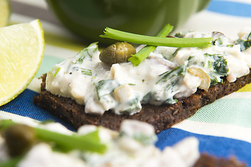 Image showing sandwiches with dark bread, herrings, mushrooms, pepper