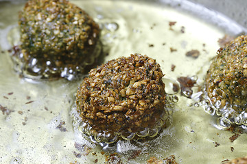 Image showing Falafel balls frying in the pan