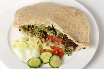 Image showing Falafel pocket sandwich with salad