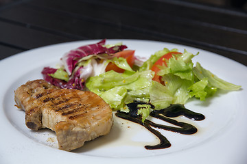 Image showing Steak with salad on the table