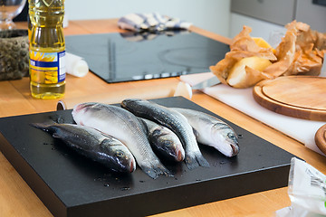 Image showing Some fishes on the kitchen's table