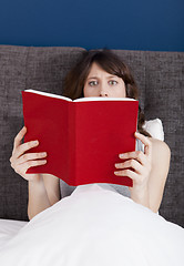 Image showing Reading a book