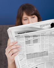 Image showing Reading the newspaper