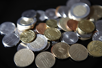 Image showing Coins on black