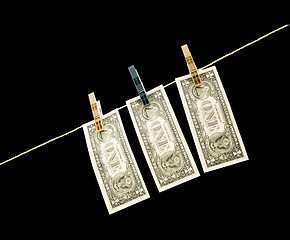 Image showing Dollars on the wire