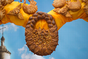 Image showing Easter decoration: beautifully baked a cake and a variety of bre