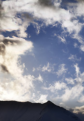 Image showing Blue sky with clouds and mountains in evening