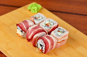 Image showing Sushi roll with bacon