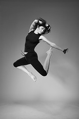 Image showing attractive jumping woman