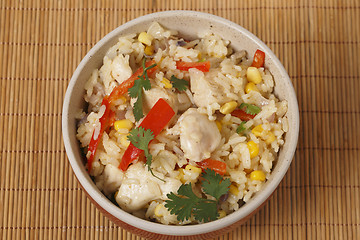 Image showing Chicken fried rice in a bowl from above