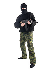 Image showing masked man stands with rifle