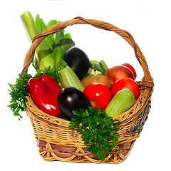 Image showing basket with vegetables isolated on white 