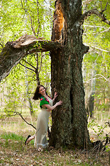 Image showing Beautiful woman near birch