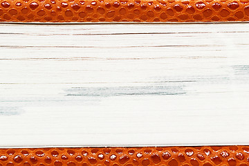 Image showing notepad of artificial red snakeskin