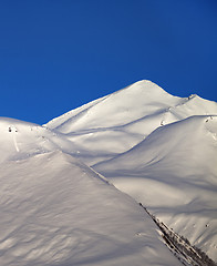 Image showing Off-piste slope and blue clear sky in nice winter morning