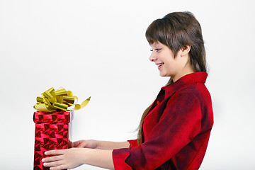 Image showing young woman with packaged gift