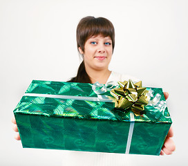 Image showing young woman with packaged gift