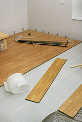 Image showing Laying  laminated panels the color of the wood