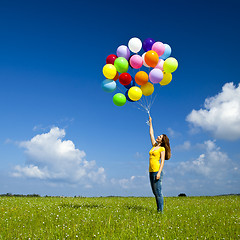 Image showing Girl with colorful balloons