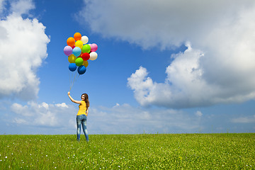 Image showing Girl with colorful balloons