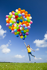 Image showing Flying with balloons