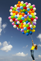 Image showing Girl with colorful balloons