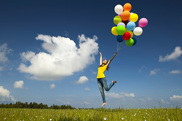 Image showing Flying with balloons