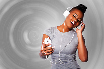 Image showing Beautiful woman listening to music