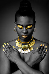 Image showing African tribal in gold