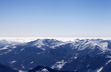 Image showing Snowy mountains in morning haze