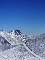 Image showing Ski resort with off piste slope at nice sun day