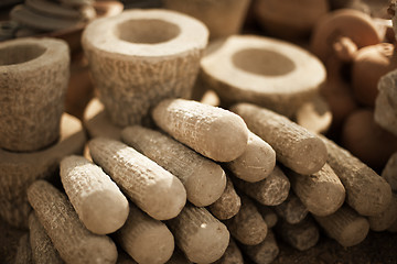 Image showing Stone products on market in Myanmar. Mortars and pestles close u