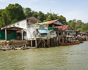 Image showing Old houses on river bank. Thailand