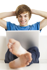 Image showing Happy man with a laptop