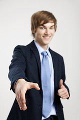 Image showing Businessman giving a handshake