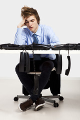 Image showing Tired man in the office