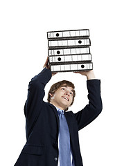 Image showing Business man carrying folders