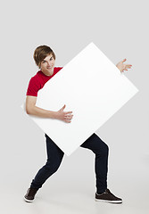 Image showing Man holding a cardboard