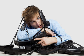 Image showing wrapped in telephones